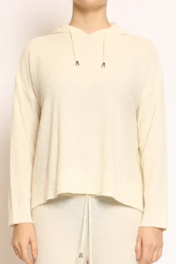Maglia in bouclu00e8 elasticizzato con cappuccio panna